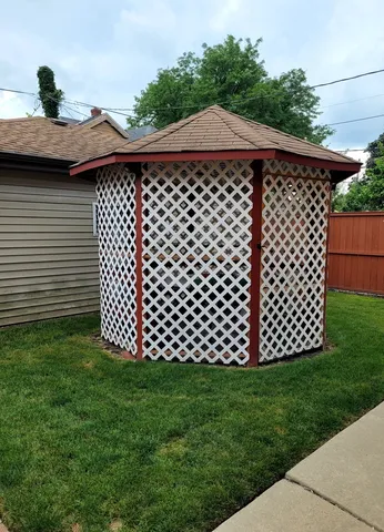 a backyard of a house with lots of green space
