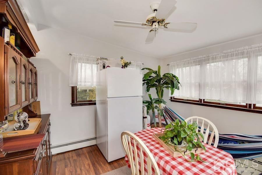 4 Finley Road Edison, NJ 08817 - Photo 12 of 32 a living room with furniture and a potted plant