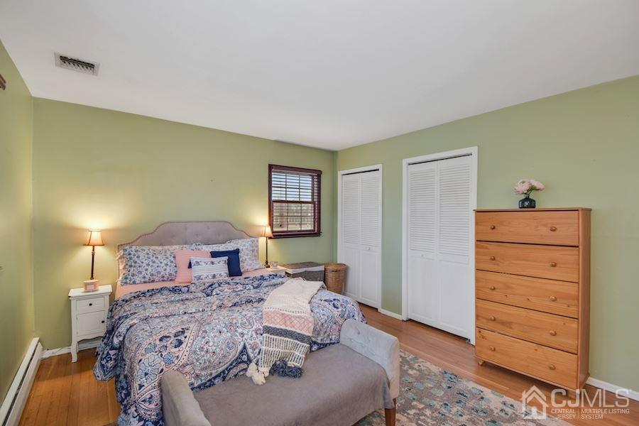 4 Finley Road Edison, NJ 08817 - Photo 19 of 32 a bed room with a bed and a window