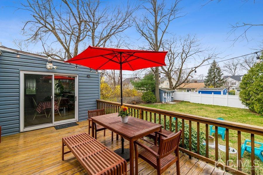 4 Finley Road Edison, NJ 08817 - Photo 24 of 32 a view of a chairs on deck in front of house