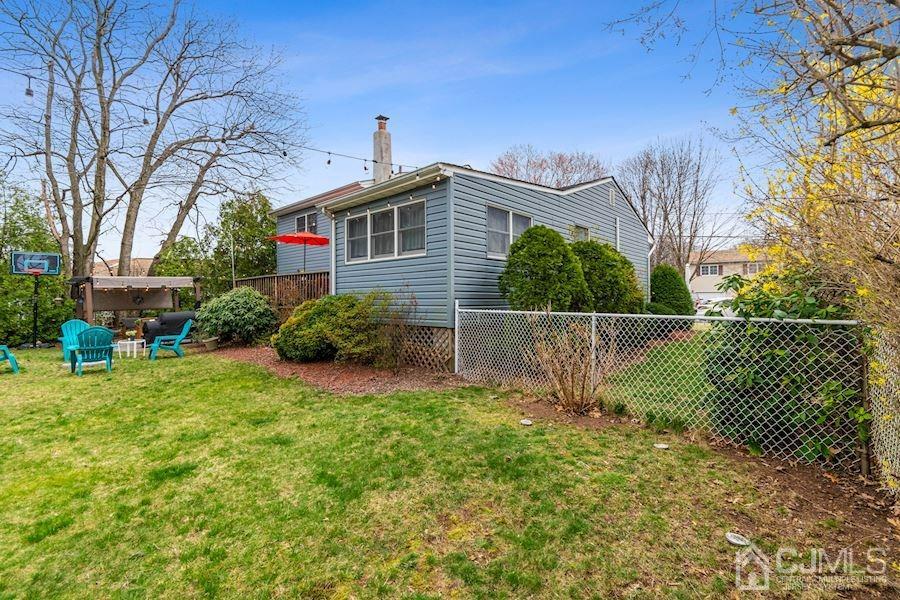 4 Finley Road Edison, NJ 08817 - Photo 30 of 32 a view of a house with a yard and plants