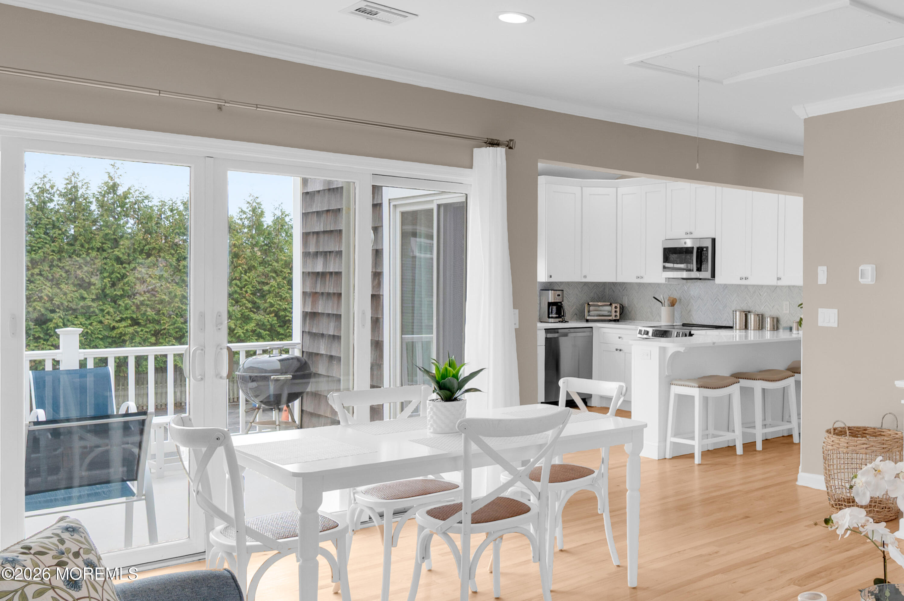 41 A Mount Street Bay Head, NJ 08742 - Photo 10 of 33 a view of a dining room with furniture window and wooden floor