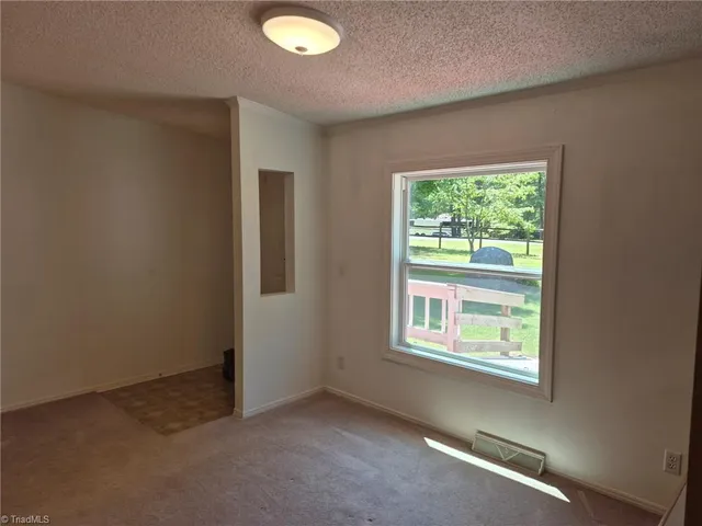 $227,500 | 44112 Harper Hearne Road, New London, NC 28127