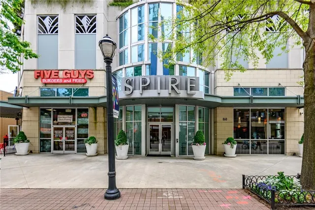a view of a cafe with an outdoor seating