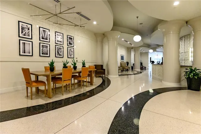 a view of a living room and kitchen