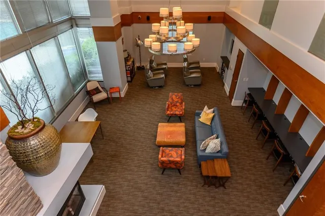 a view of living room with furniture and flat screen tv