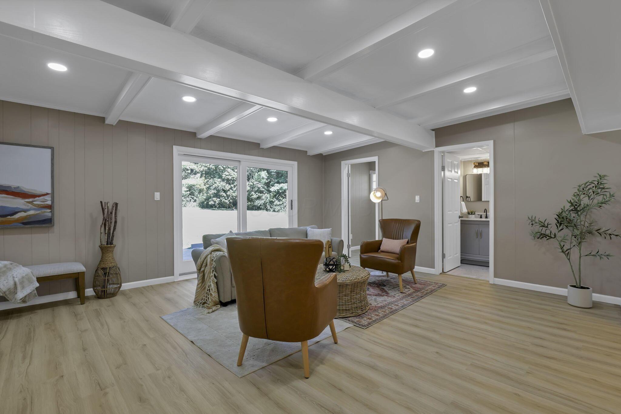 3701 Dublin Road Columbus, OH 43221 - Photo 21 of 55 Great room with added can lights, natural dunlight floating in from the patio doors