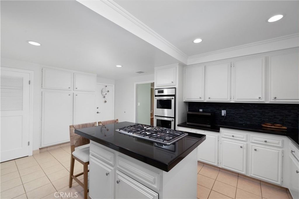 3611 Grayburn Road Pasadena, CA 91107 - Photo 15 of 41 a kitchen with a stove and a sink