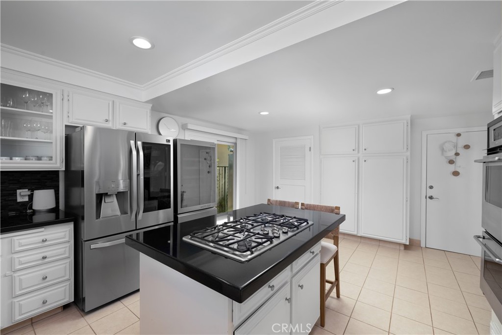 3611 Grayburn Road Pasadena, CA 91107 - Photo 16 of 41 a kitchen with a stove and a refrigerator