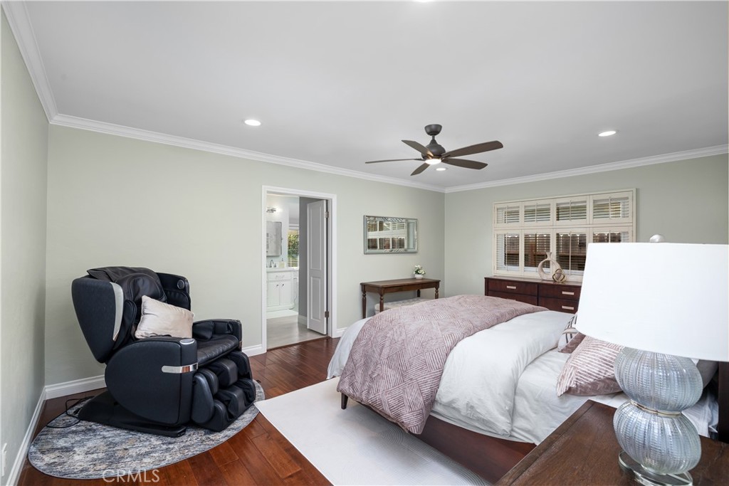 3611 Grayburn Road Pasadena, CA 91107 - Photo 17 of 41 a bedroom with a bed and wooden floor