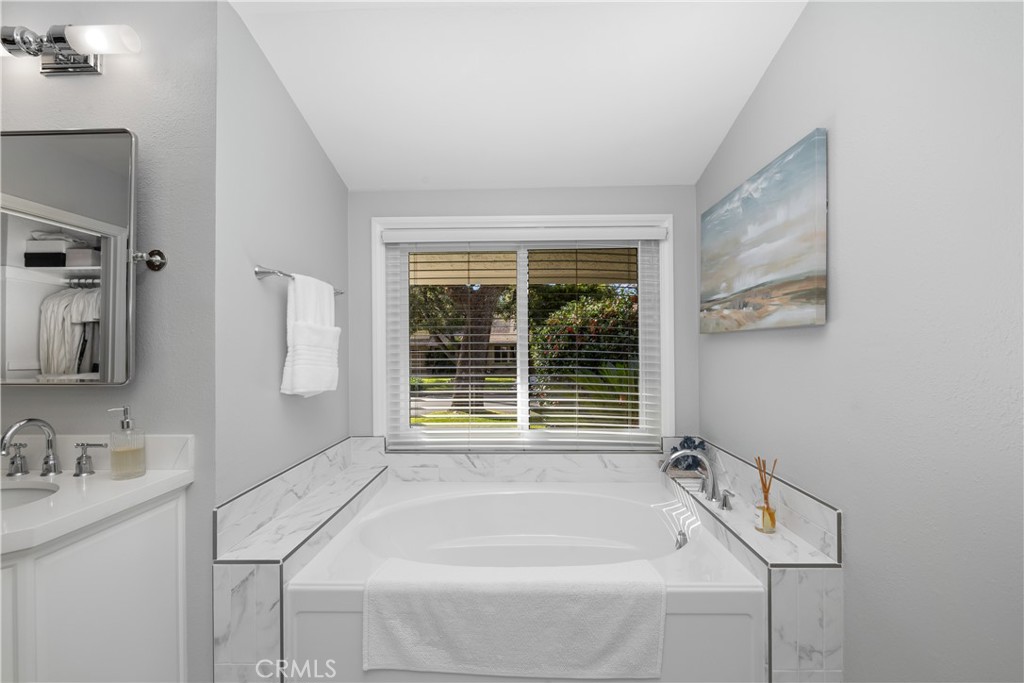 3611 Grayburn Road Pasadena, CA 91107 - Photo 21 of 41 a bathroom with a tub sink and window