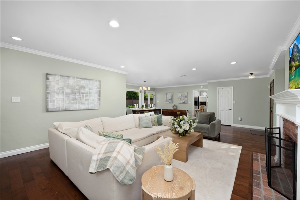 3611 Grayburn Road Pasadena, CA 91107 - Photo 6 of 41 a living room with furniture and a wooden floor