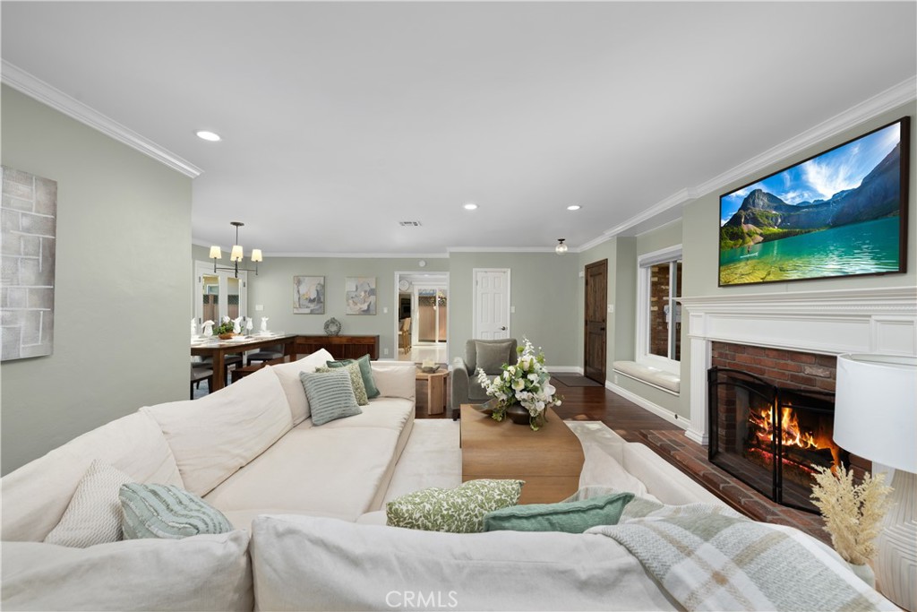 3611 Grayburn Road Pasadena, CA 91107 - Photo 7 of 41 a living room with furniture and a fireplace