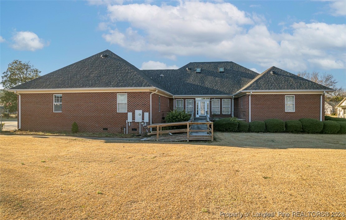 405 South Bond Street Rowland, NC 28383 - Photo 16 of 19 a front view of a house with a yard