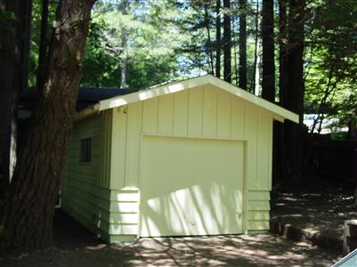 17 Springhill Drive Cazadero, CA 95421 - Photo 7 of 8 a blue house with trees in front of it