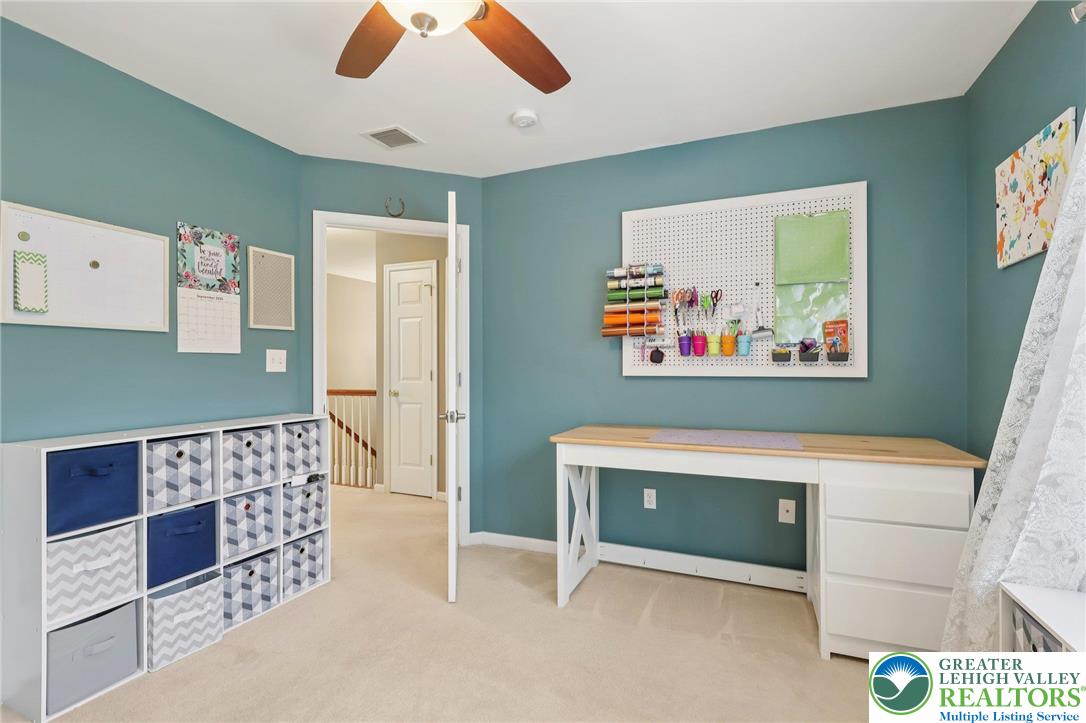 5192 Spring Ridge Drive East Macungie, PA 18062 - Photo 16 of 22 a view of workspace with furniture and a ceiling fan