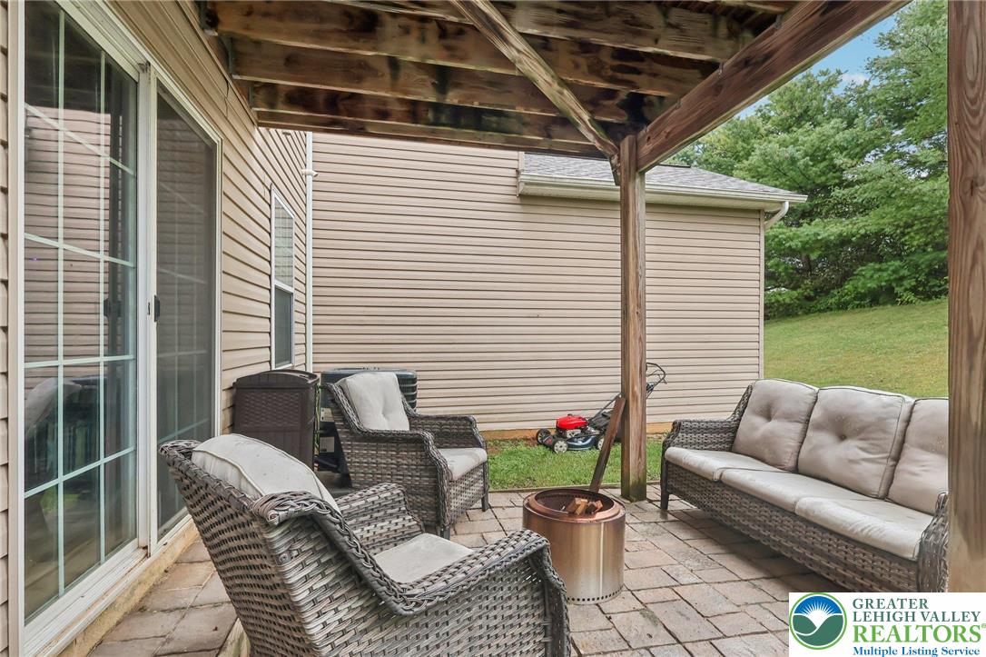 5192 Spring Ridge Drive East Macungie, PA 18062 - Photo 20 of 22 a balcony with furniture and a potted plant