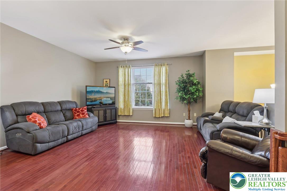5192 Spring Ridge Drive East Macungie, PA 18062 - Photo 3 of 22 a living room with furniture and a large window
