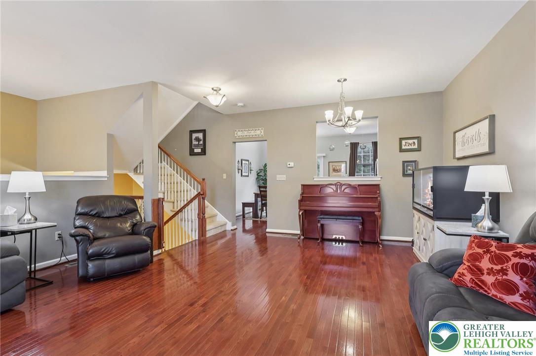 5192 Spring Ridge Drive East Macungie, PA 18062 - Photo 4 of 22 a living room with furniture and wooden floor