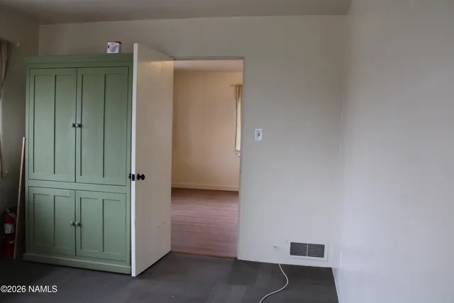 a view of livingroom with kitchen
