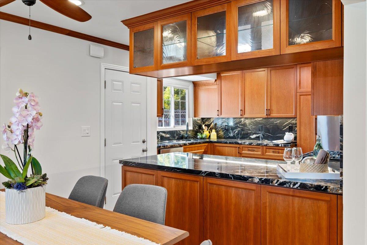 3530 Casanova Drive San Mateo, CA 94403 - Photo 15 of 50 a kitchen with stainless steel appliances granite countertop a sink and a refrigerator