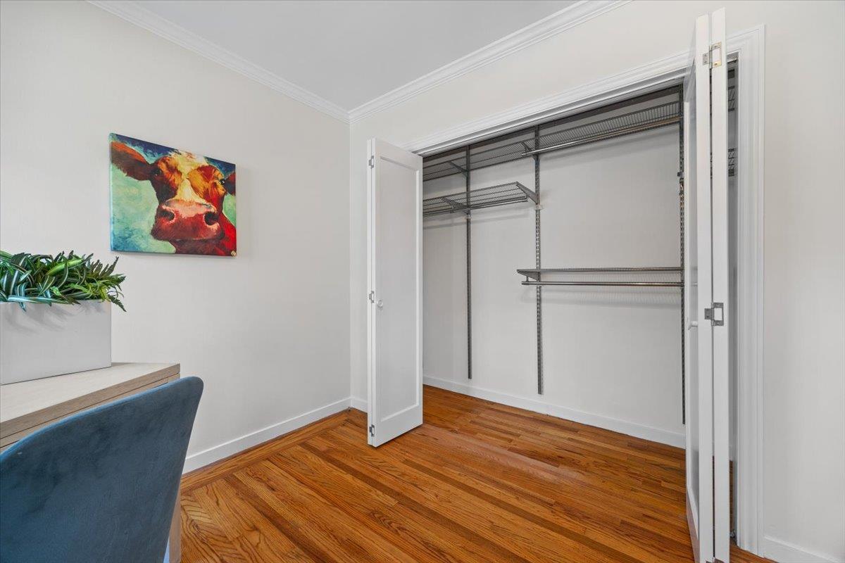 3530 Casanova Drive San Mateo, CA 94403 - Photo 22 of 50 a view of a room with wooden floor and cabinet