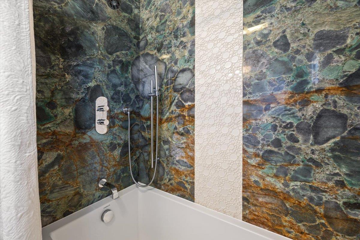 3530 Casanova Drive San Mateo, CA 94403 - Photo 26 of 50 a bathroom with a shower and a sink