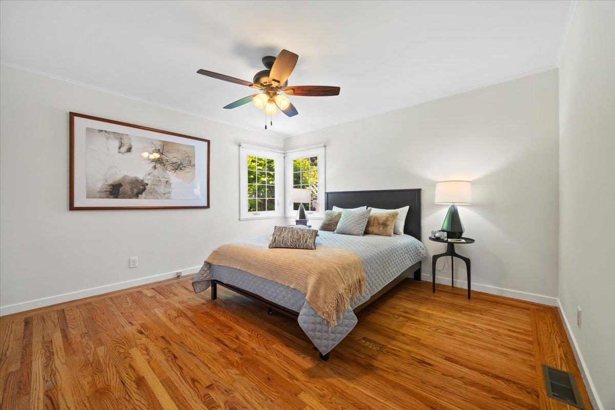 3530 Casanova Drive San Mateo, CA 94403 - Photo 28 of 50 a bedroom with a bed and a chandelier