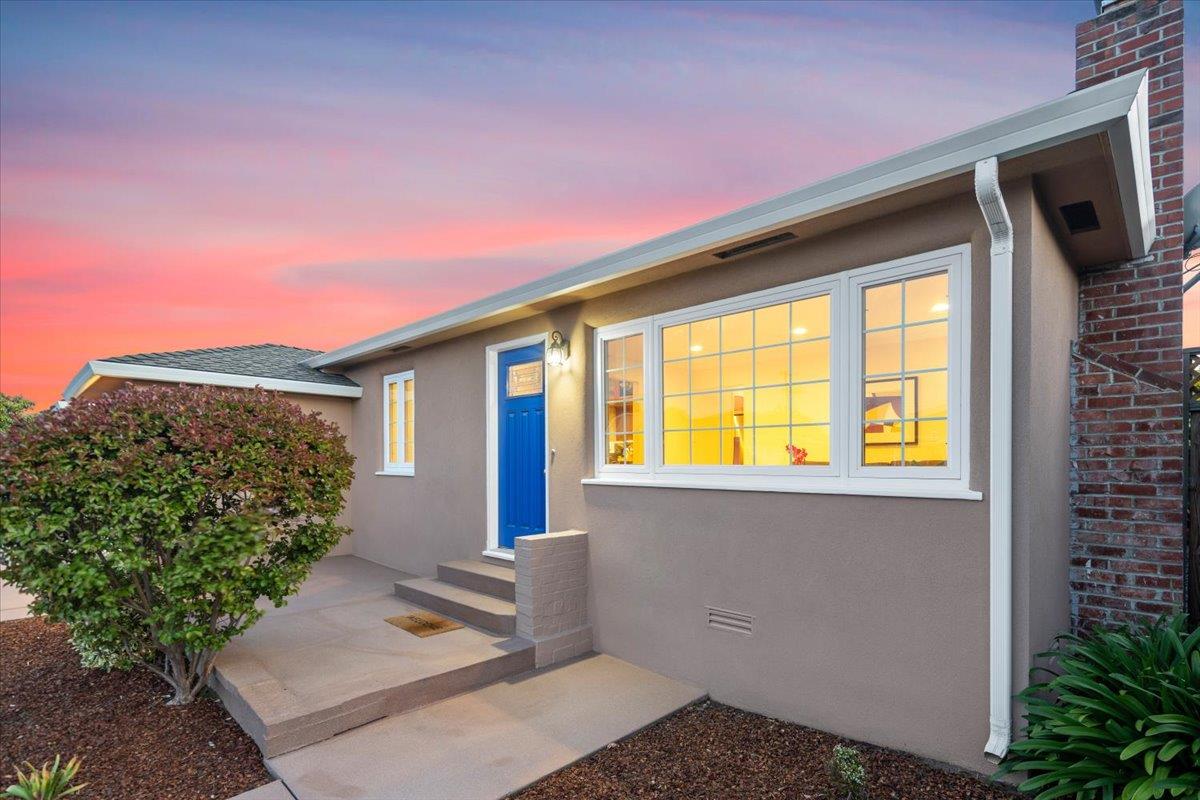 3530 Casanova Drive San Mateo, CA 94403 - Photo 3 of 50 a front view of a house with trees