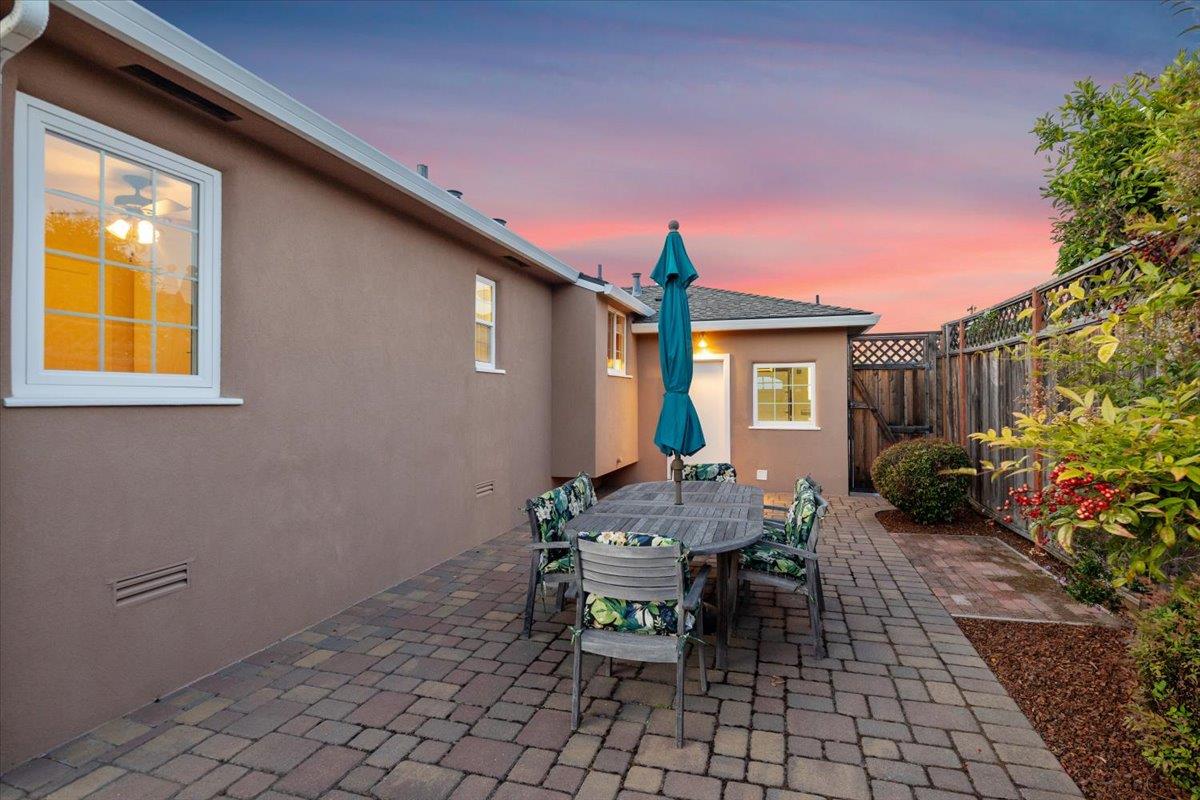 3530 Casanova Drive San Mateo, CA 94403 - Photo 32 of 50 a backyard of a house with table and chairs