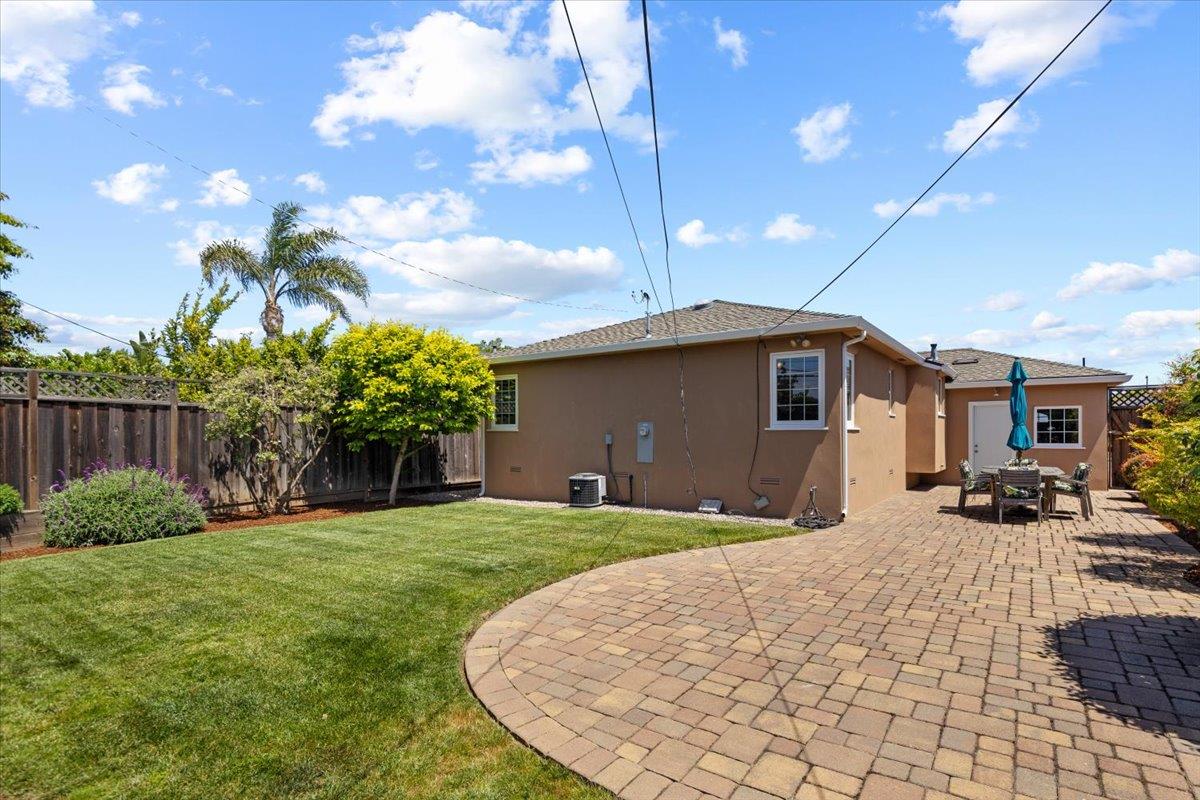 3530 Casanova Drive San Mateo, CA 94403 - Photo 34 of 50 a front view of a house with a yard and potted plants