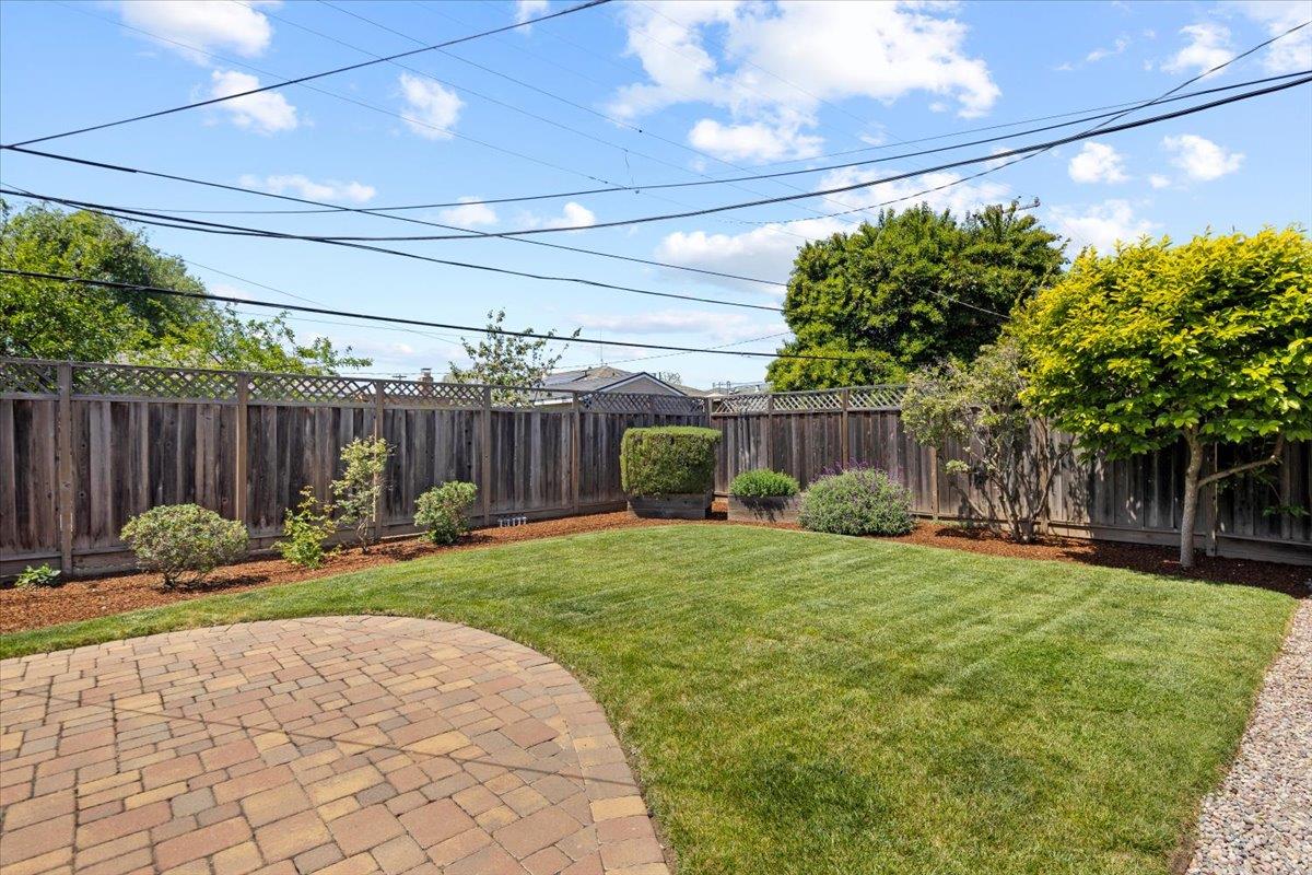 3530 Casanova Drive San Mateo, CA 94403 - Photo 39 of 50 a backyard of a house with table and chairs with plants
