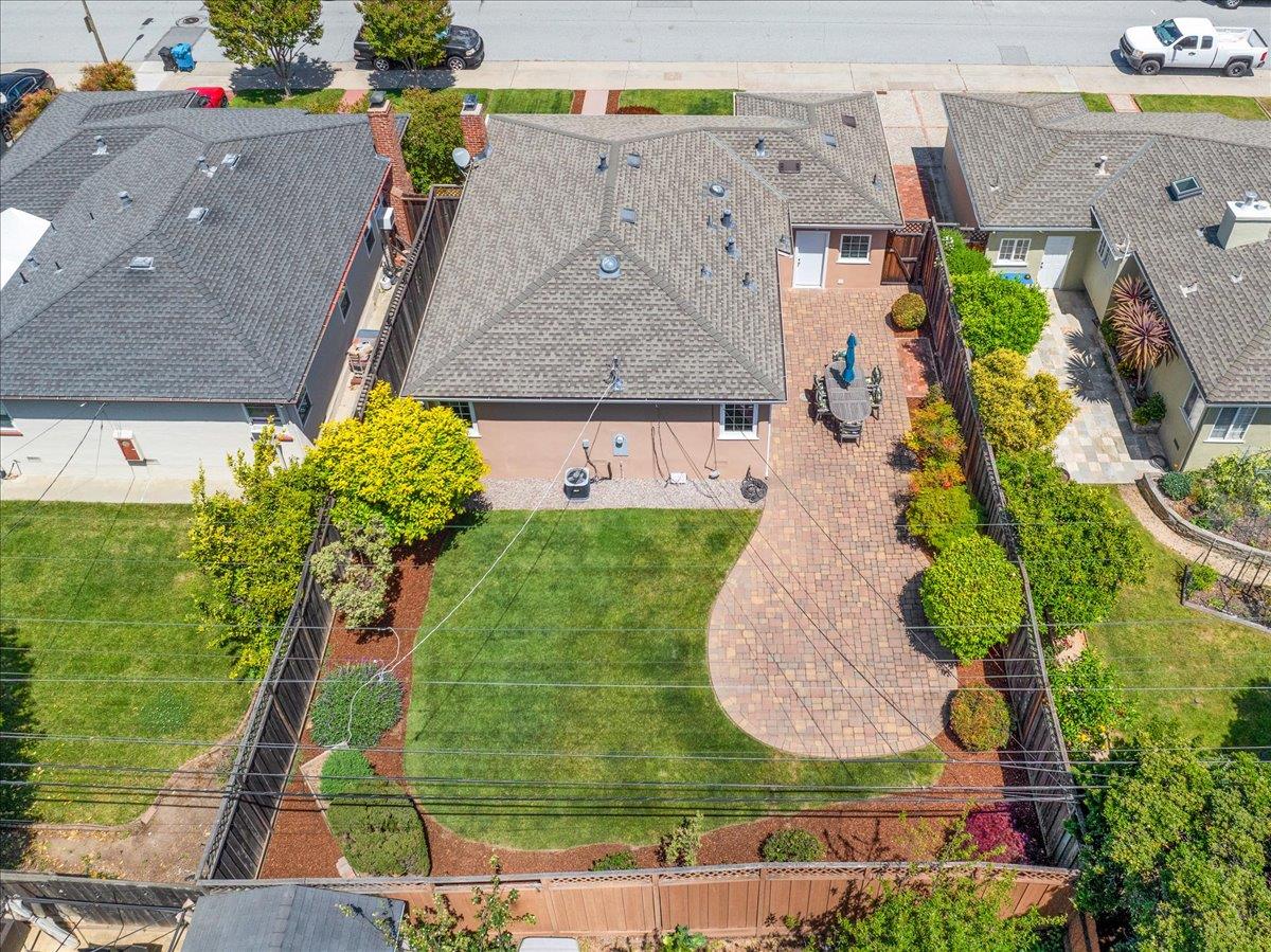 3530 Casanova Drive San Mateo, CA 94403 - Photo 46 of 50 an aerial view of a house with a yard and a large tree
