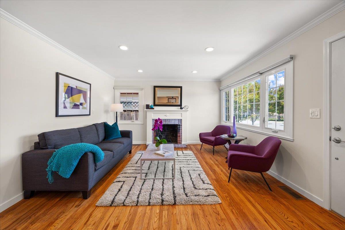 3530 Casanova Drive San Mateo, CA 94403 - Photo 9 of 50 a living room with furniture and a fireplace