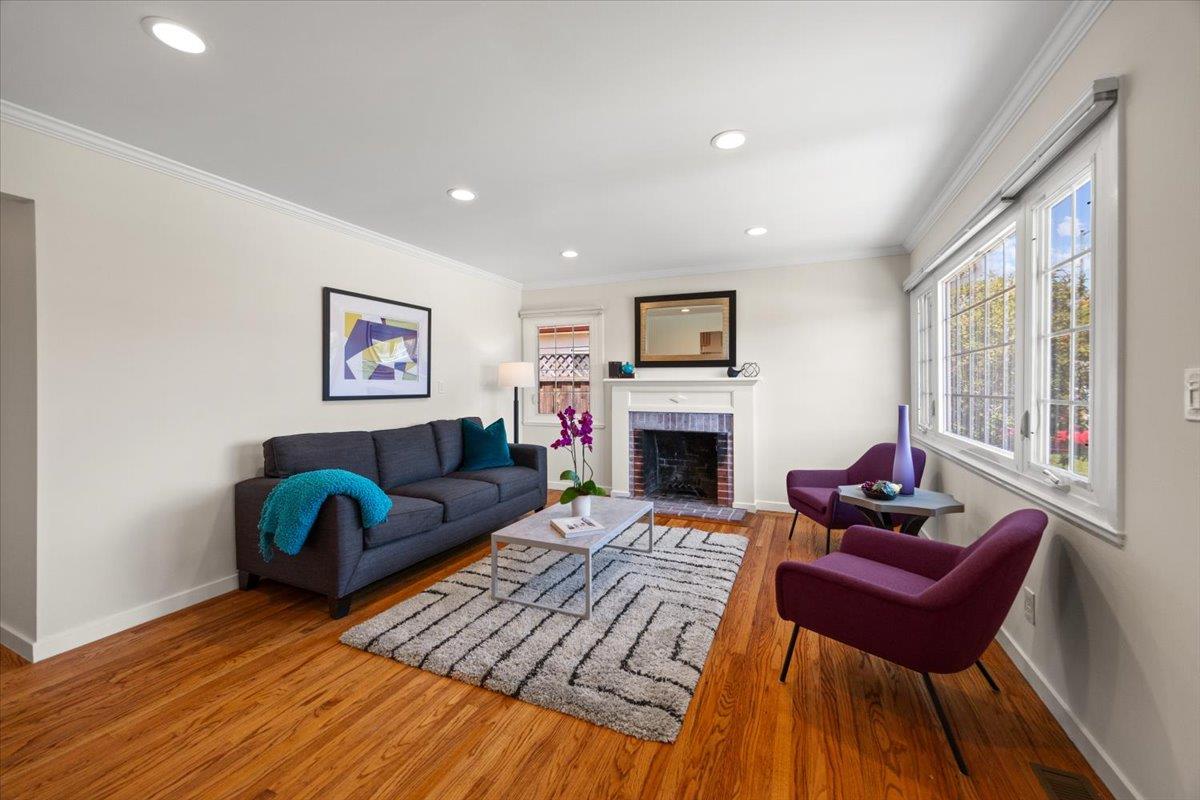 3530 Casanova Drive San Mateo, CA 94403 - Photo 10 of 50 a living room with furniture or couch and a fireplace