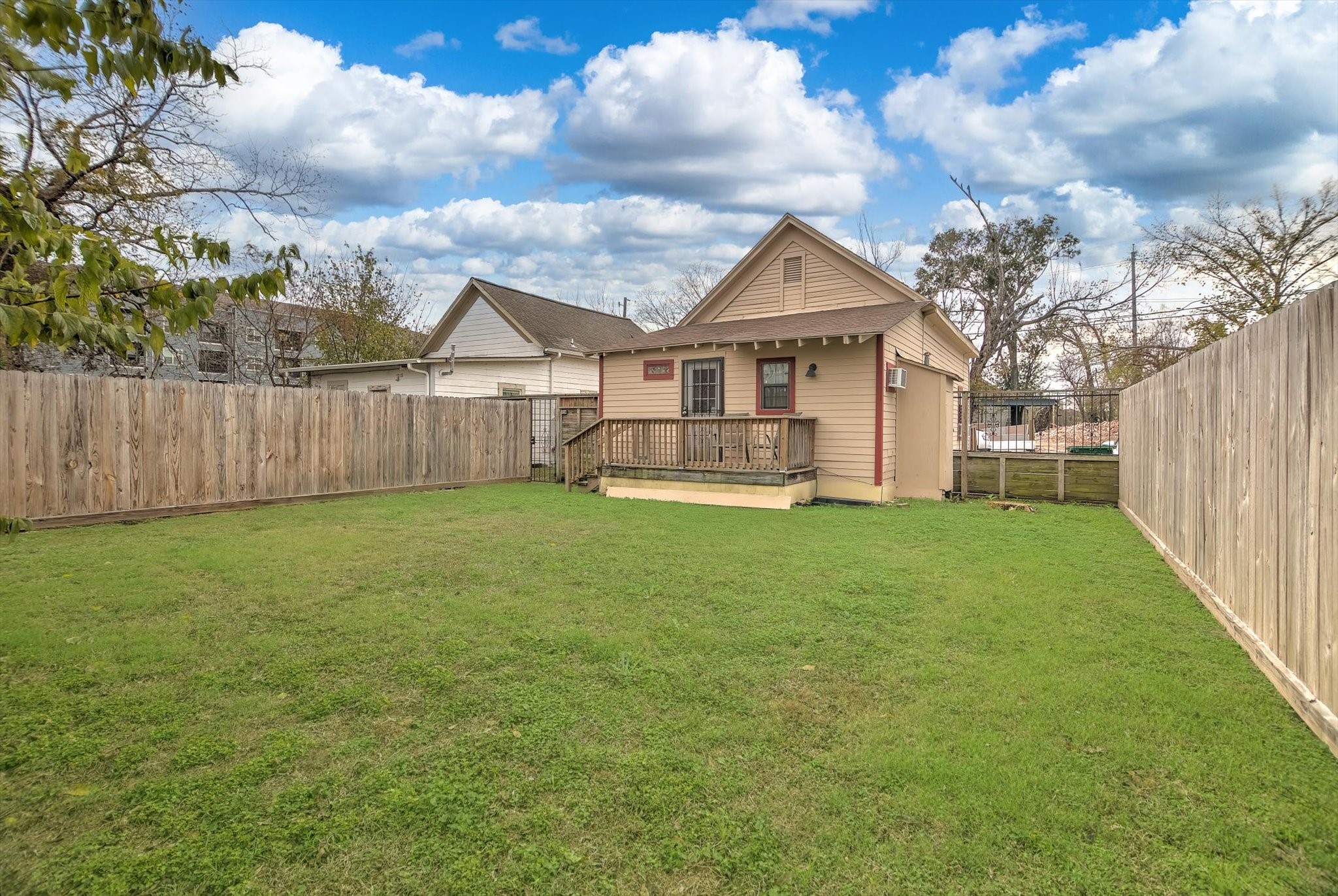 515 Bishop Street Houston, TX 77009 - Photo 15 of 18 a view of a house with a back yard