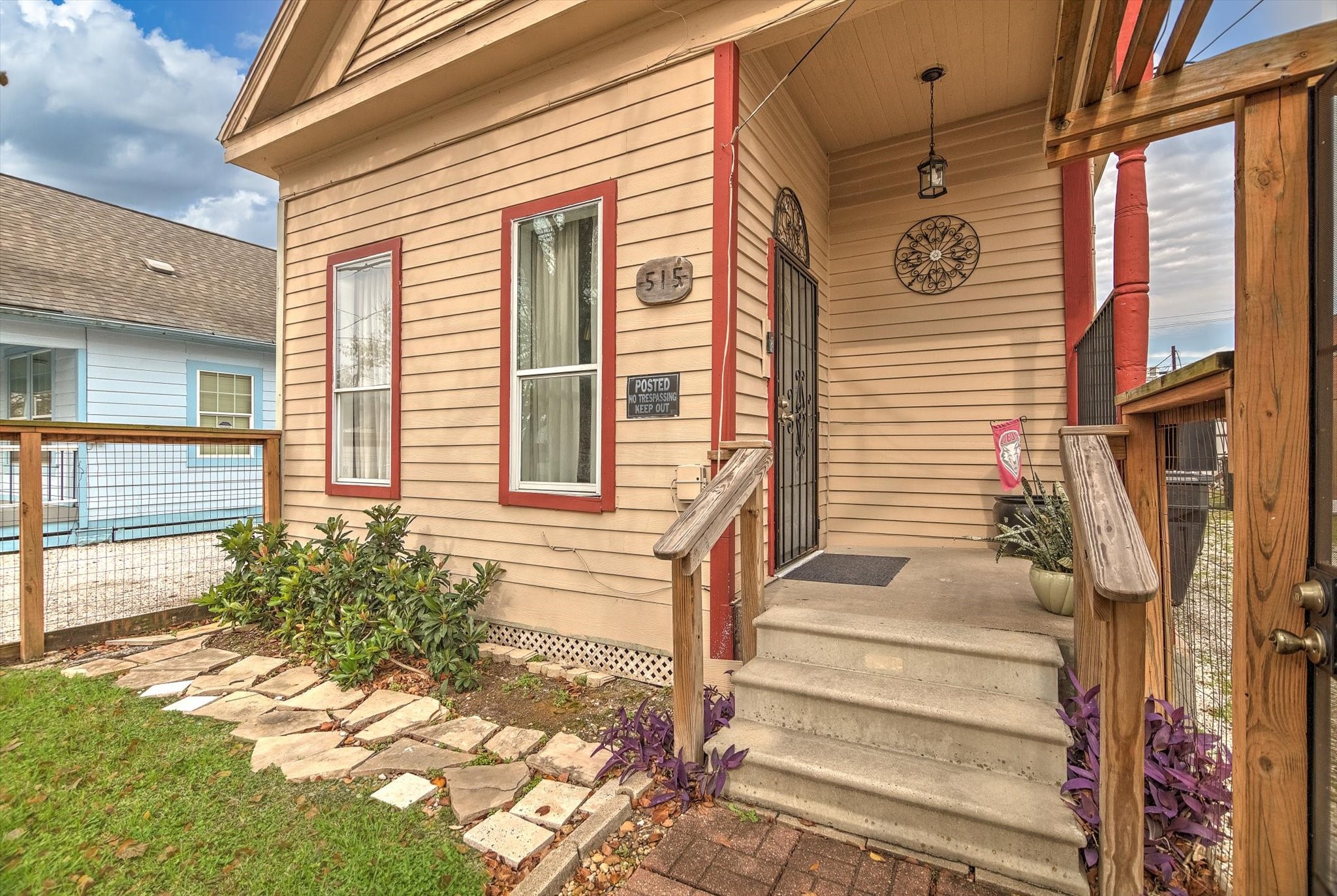 515 Bishop Street Houston, TX 77009 - Photo 3 of 18 a view of a house with more windows and wooden fence
