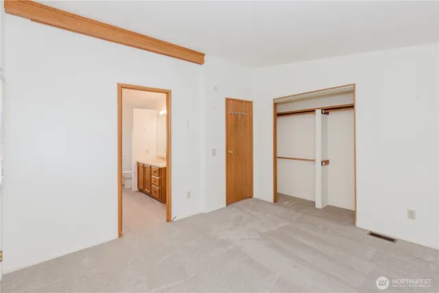 a bathroom with a sink a vanity and a mirror