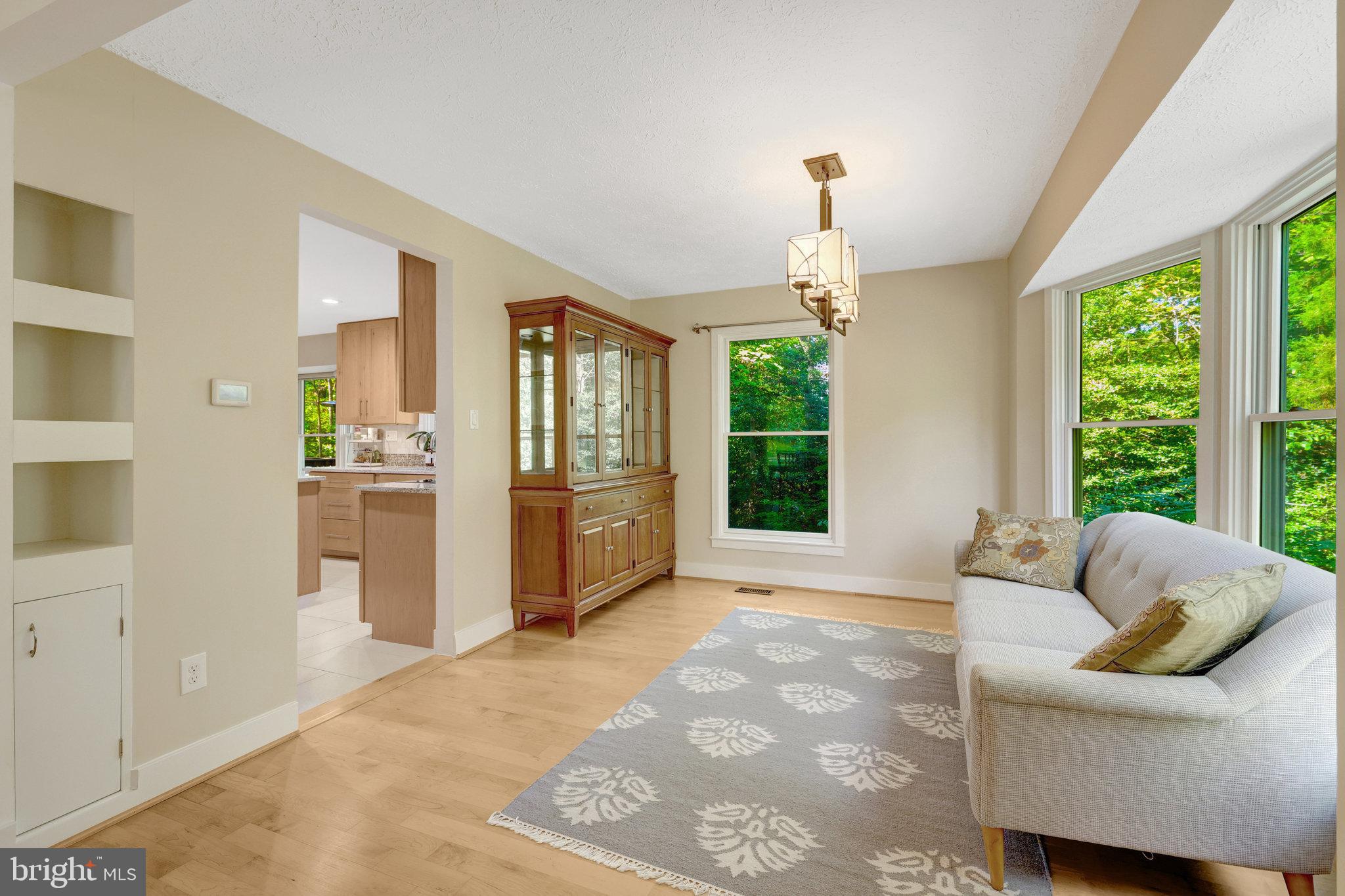 11637 Quail Ridge Court Reston, VA 20194 - Photo 13 of 40 a living room with furniture and a large window