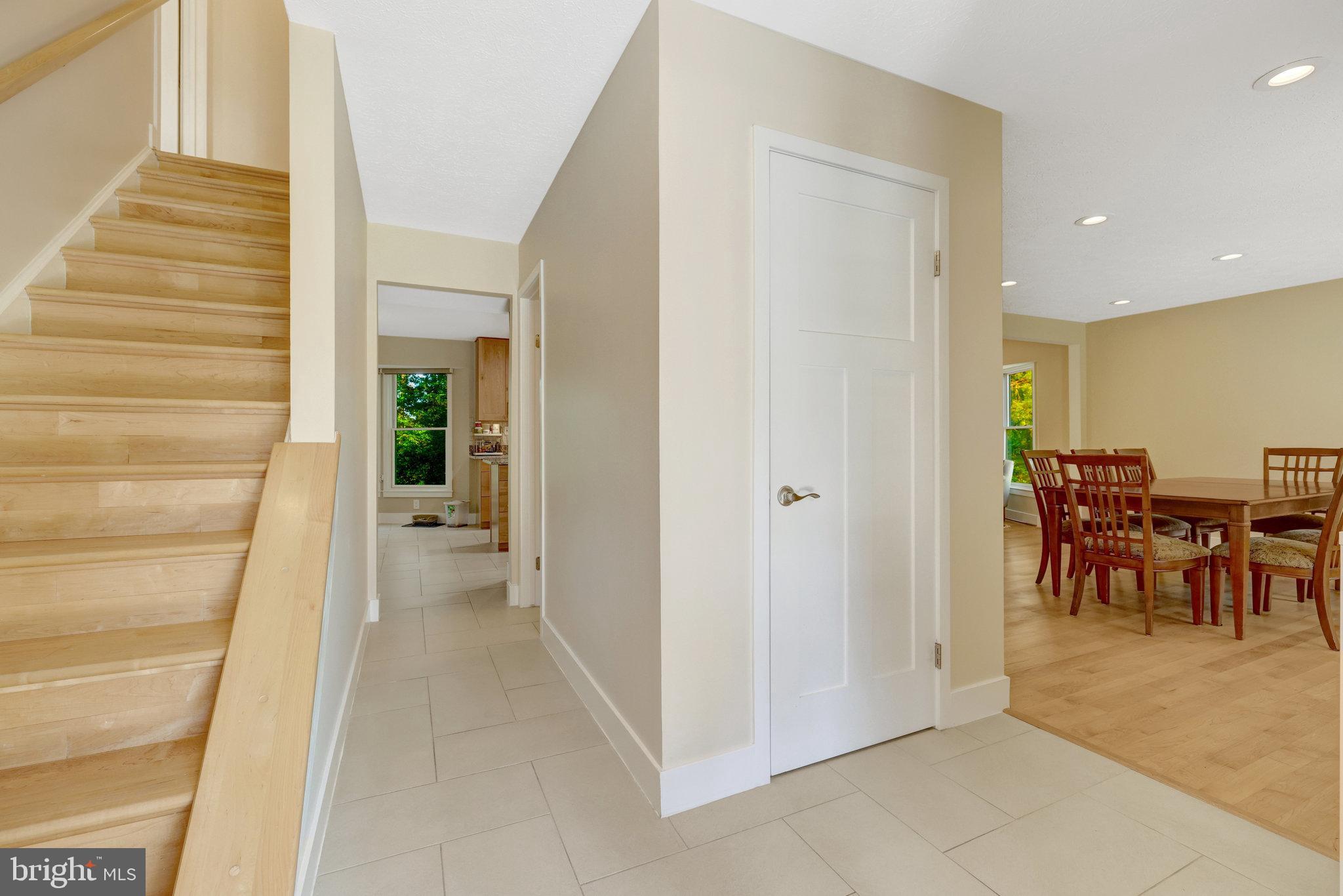 11637 Quail Ridge Court Reston, VA 20194 - Photo 3 of 40 a view of a hallway with a table and chairs