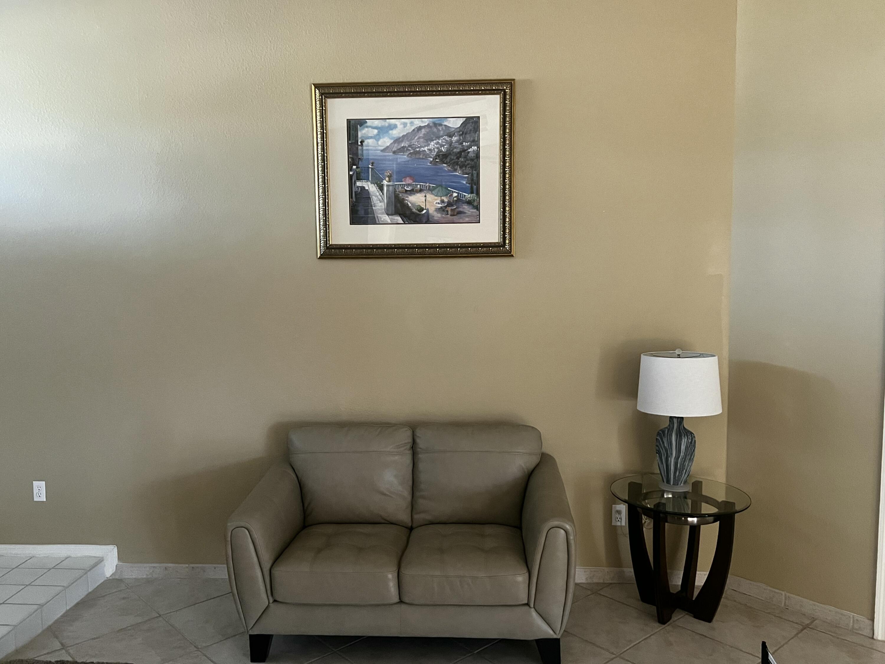 2937 Southeast Cates Circle Port St. Lucie, FL 34952 - Photo 16 of 43 a living room with furniture and a lamp
