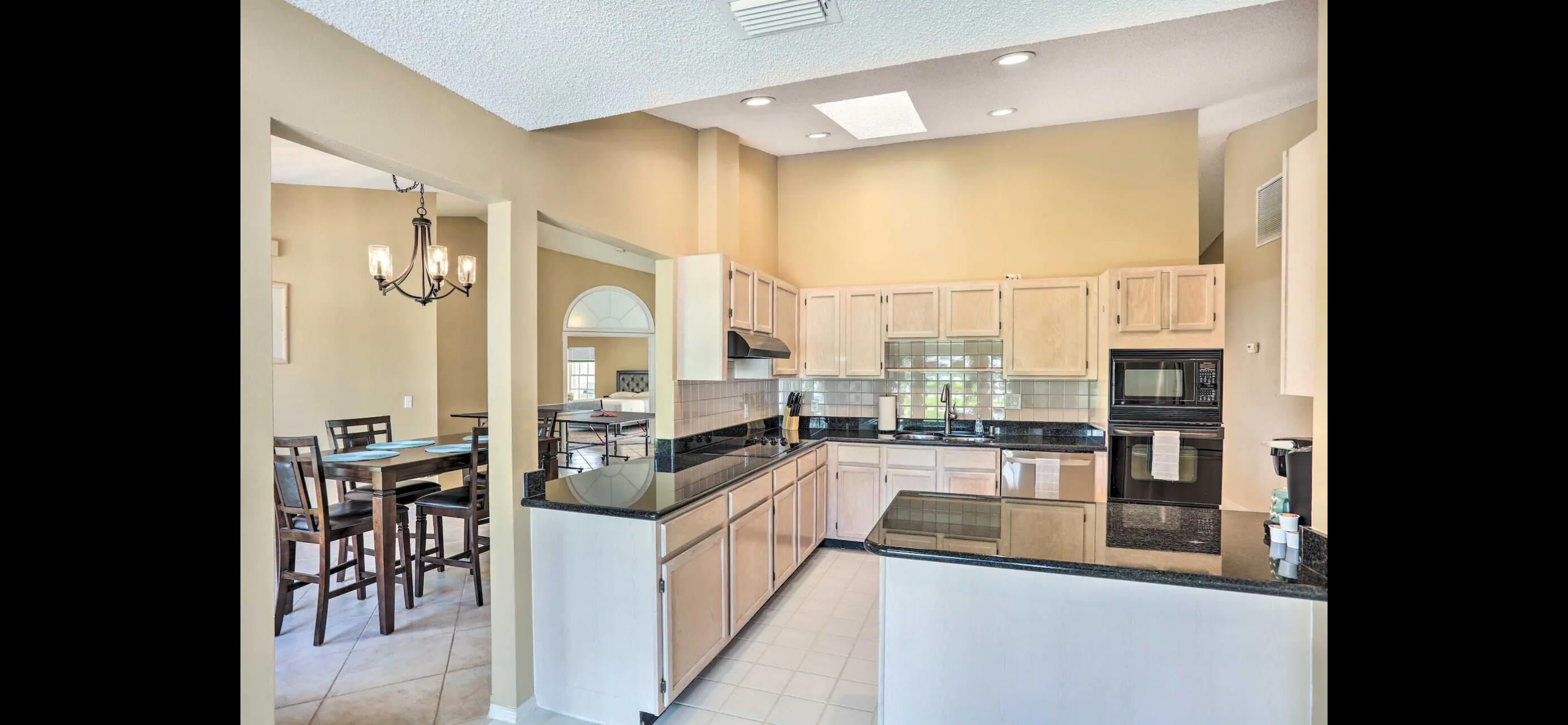 2937 Southeast Cates Circle Port St. Lucie, FL 34952 - Photo 19 of 43 a kitchen with counter top space a sink and appliances