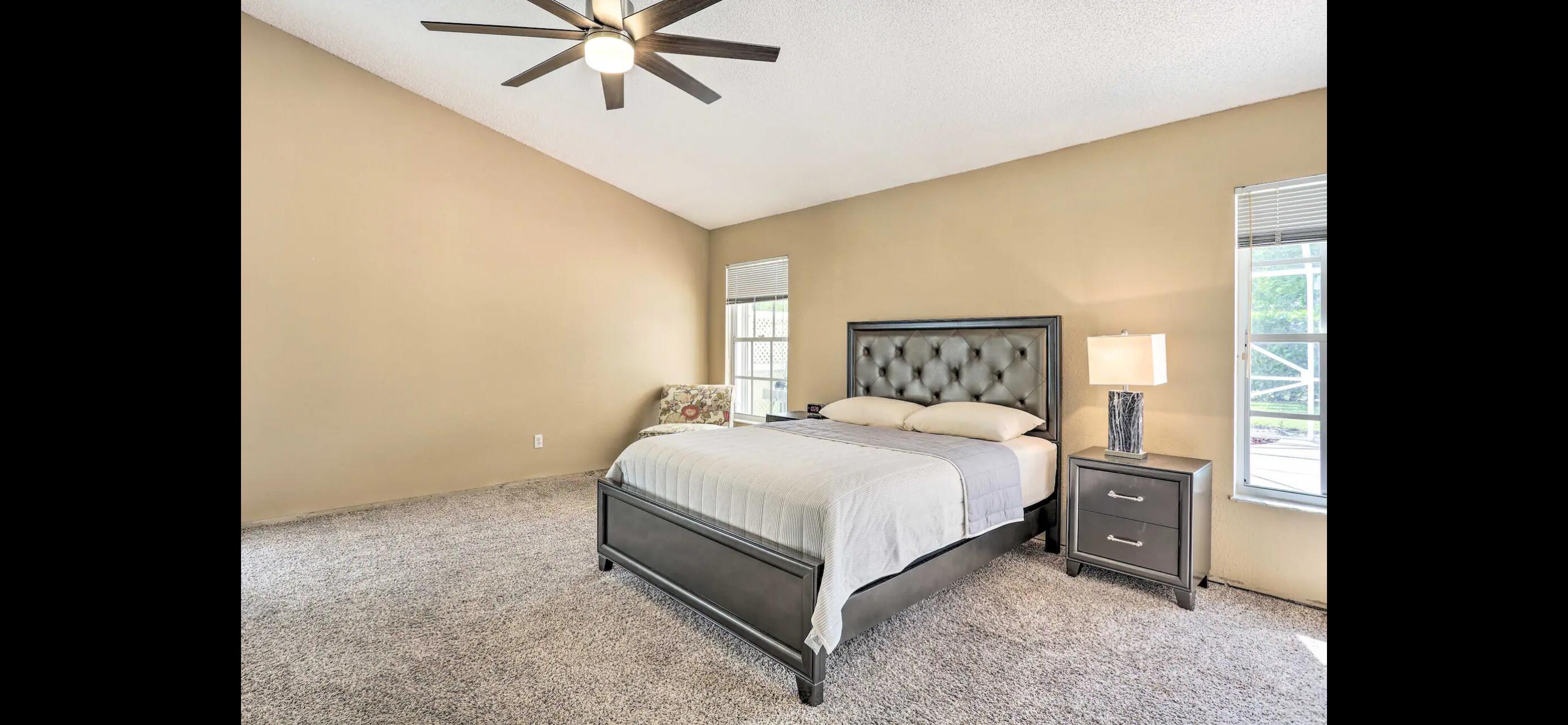 2937 Southeast Cates Circle Port St. Lucie, FL 34952 - Photo 26 of 43 a bedroom with a bed and window