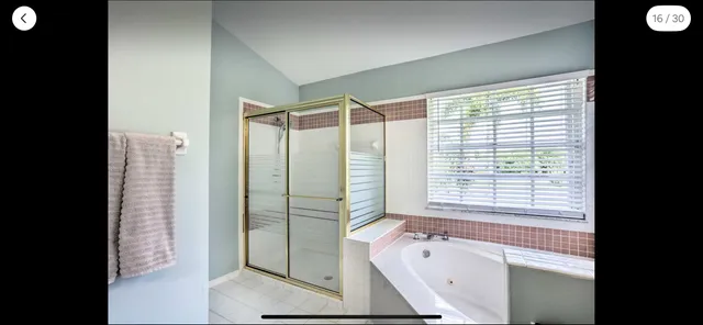 a view of a workspace with furniture