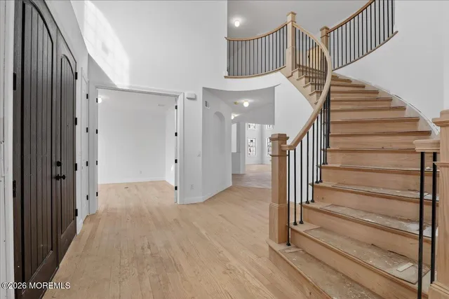 a view of entryway with wooden floor