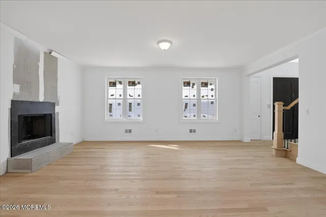 a view of a livingroom with a fireplace