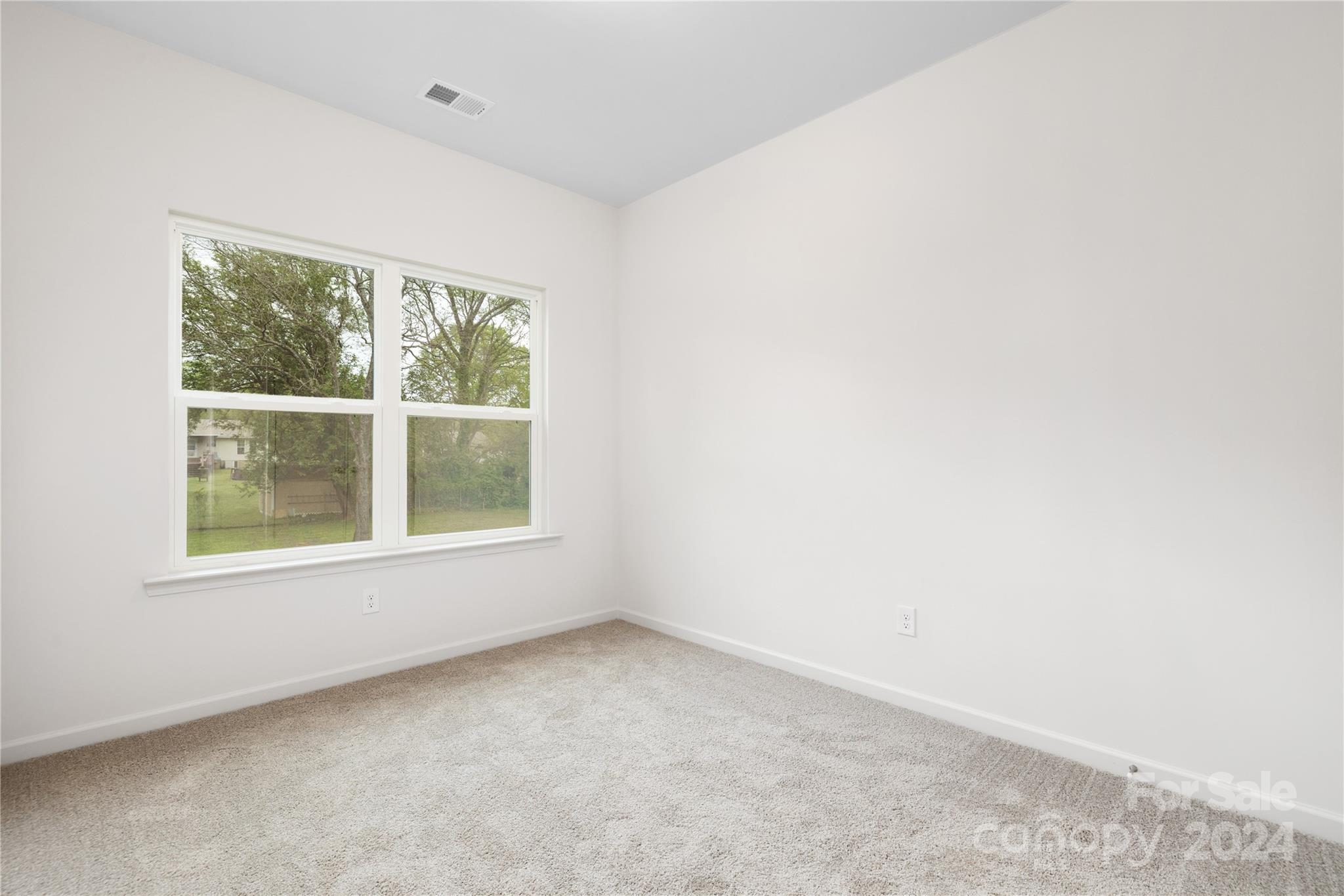 2733 Capitol Drive Charlotte, NC 28208 - Photo 16 of 20 an empty room with a window