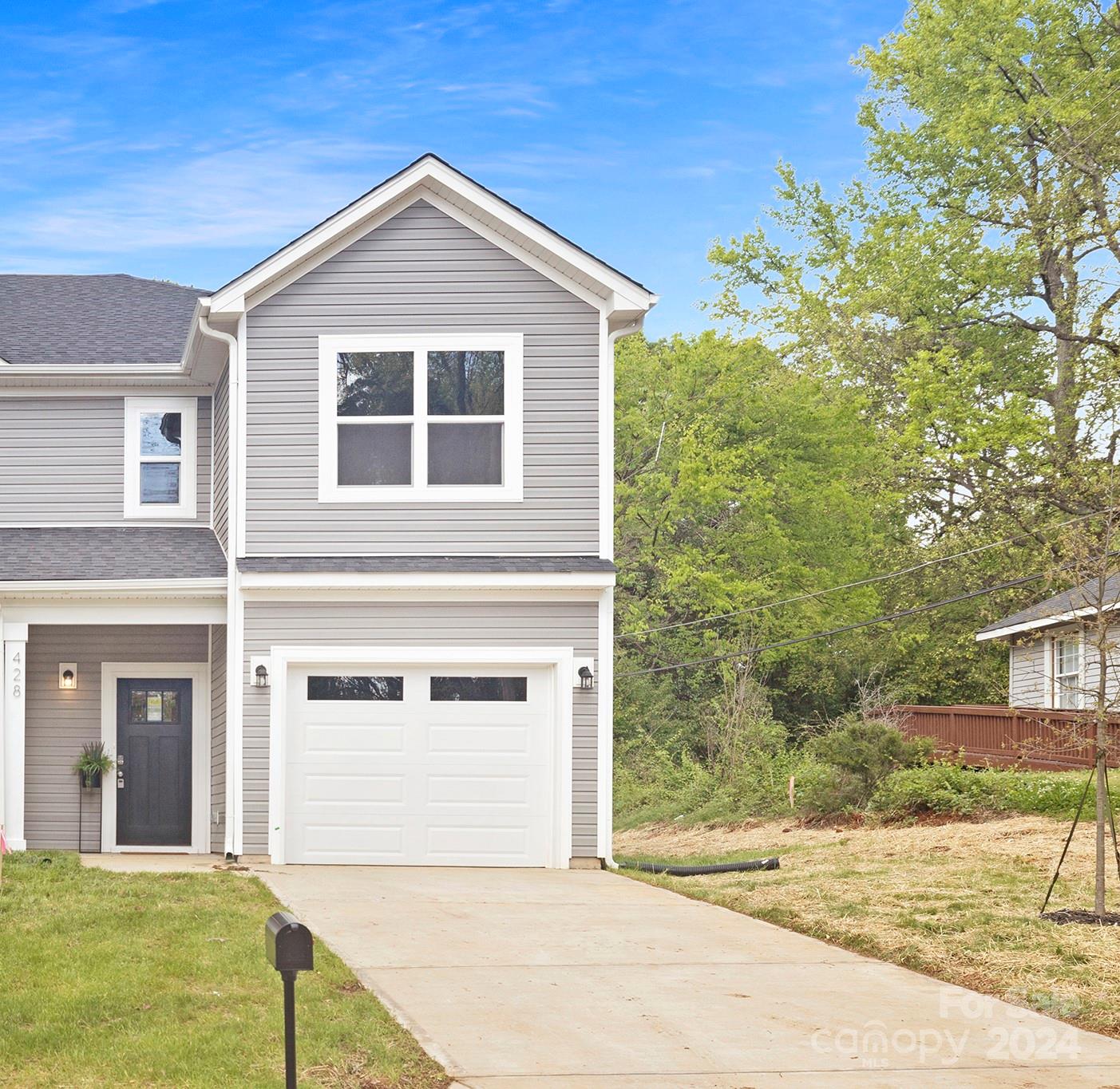 2733 Capitol Drive Charlotte, NC 28208 - Photo 20 of 20 a front view of a house with a yard