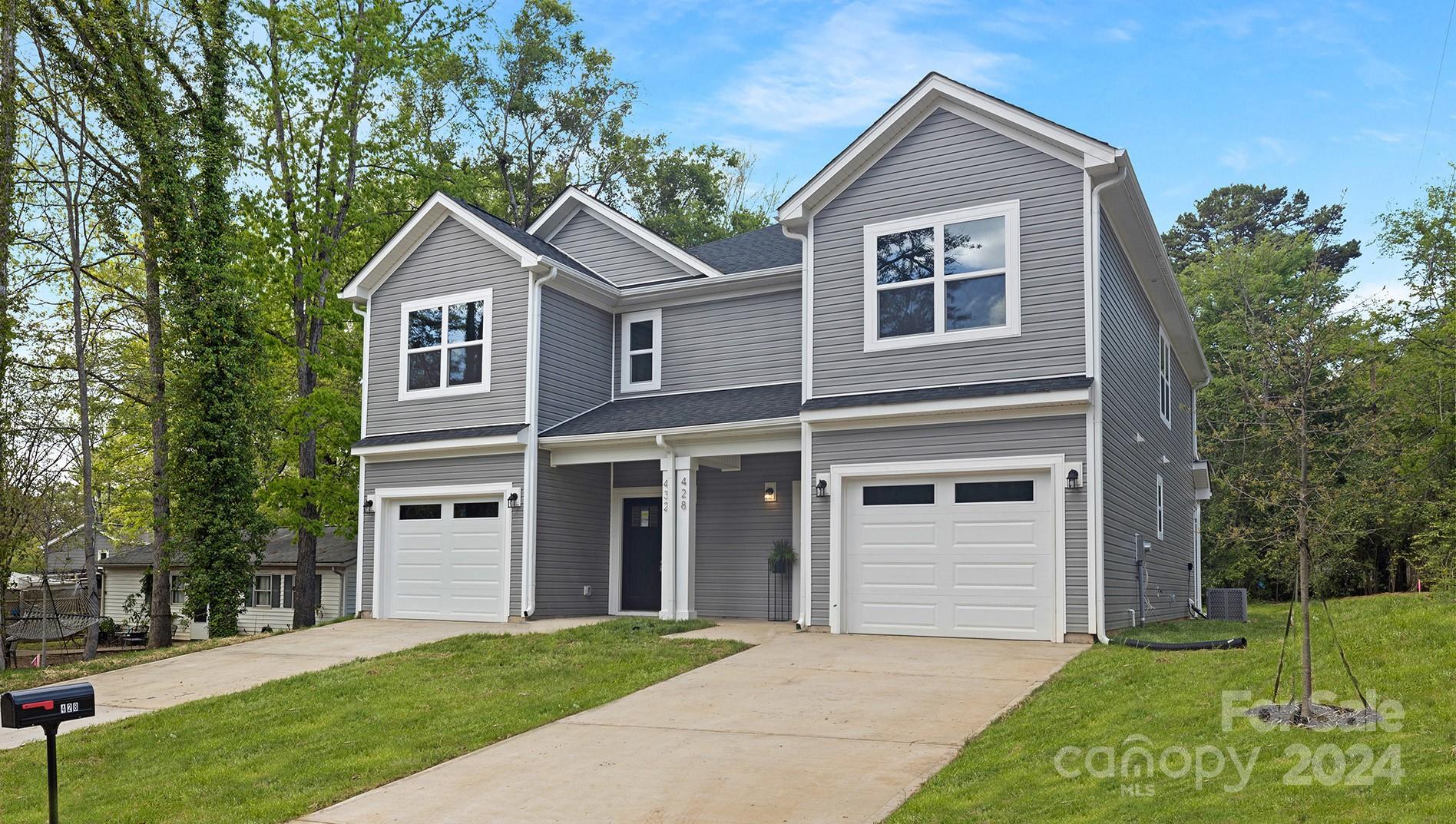 2733 Capitol Drive Charlotte, NC 28208 - Photo 2 of 20 a view of house with a yard