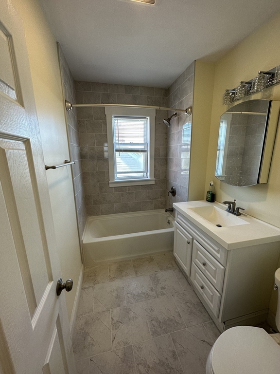 35 George Street, Unit 3 Everett, MA 02149 - Photo 13 of 34 a bathroom with a sink toilet tub and shower